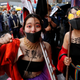 Protesters participate in a rally against Japan's imperial system